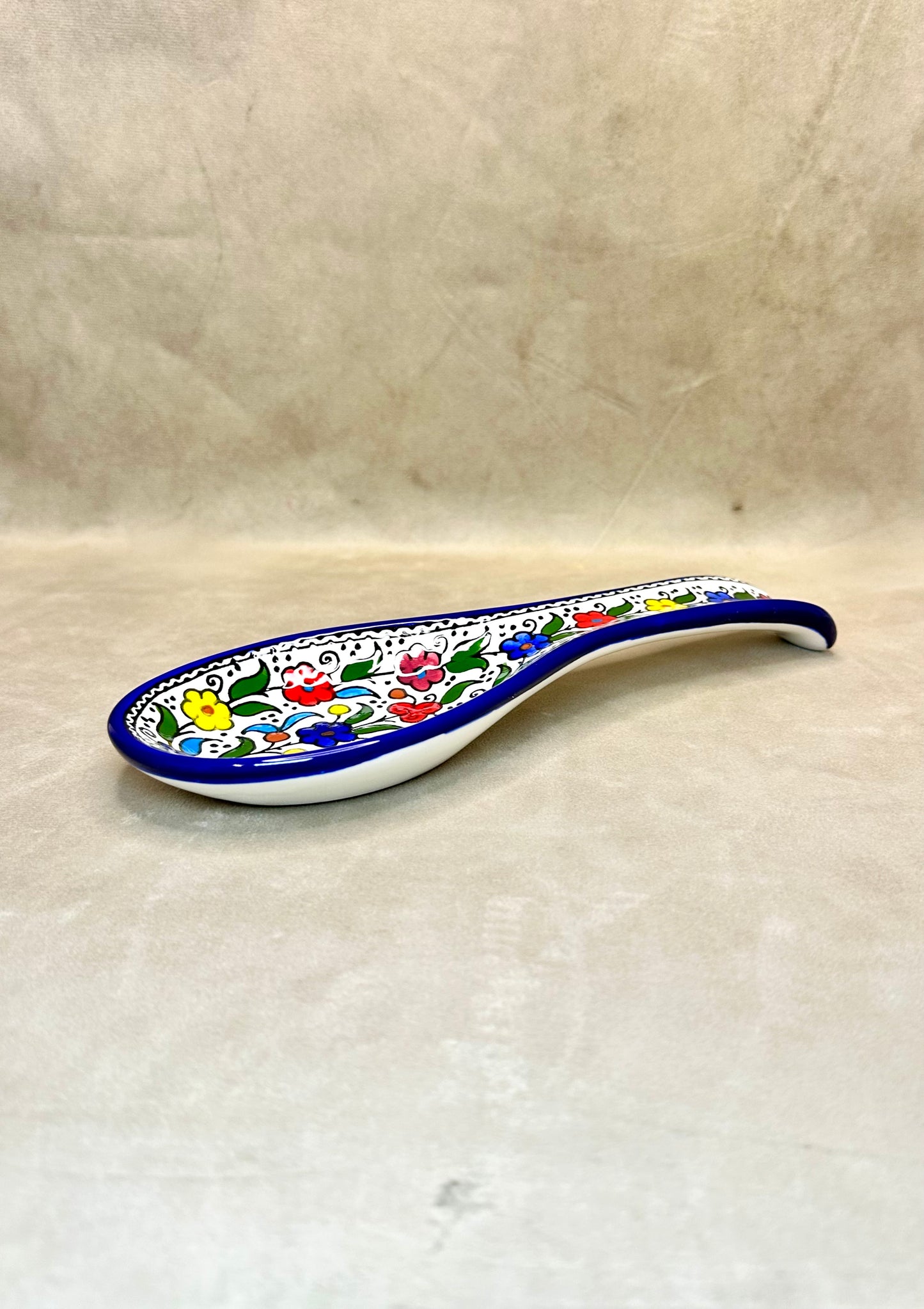 Serving plate in spoon shape colored