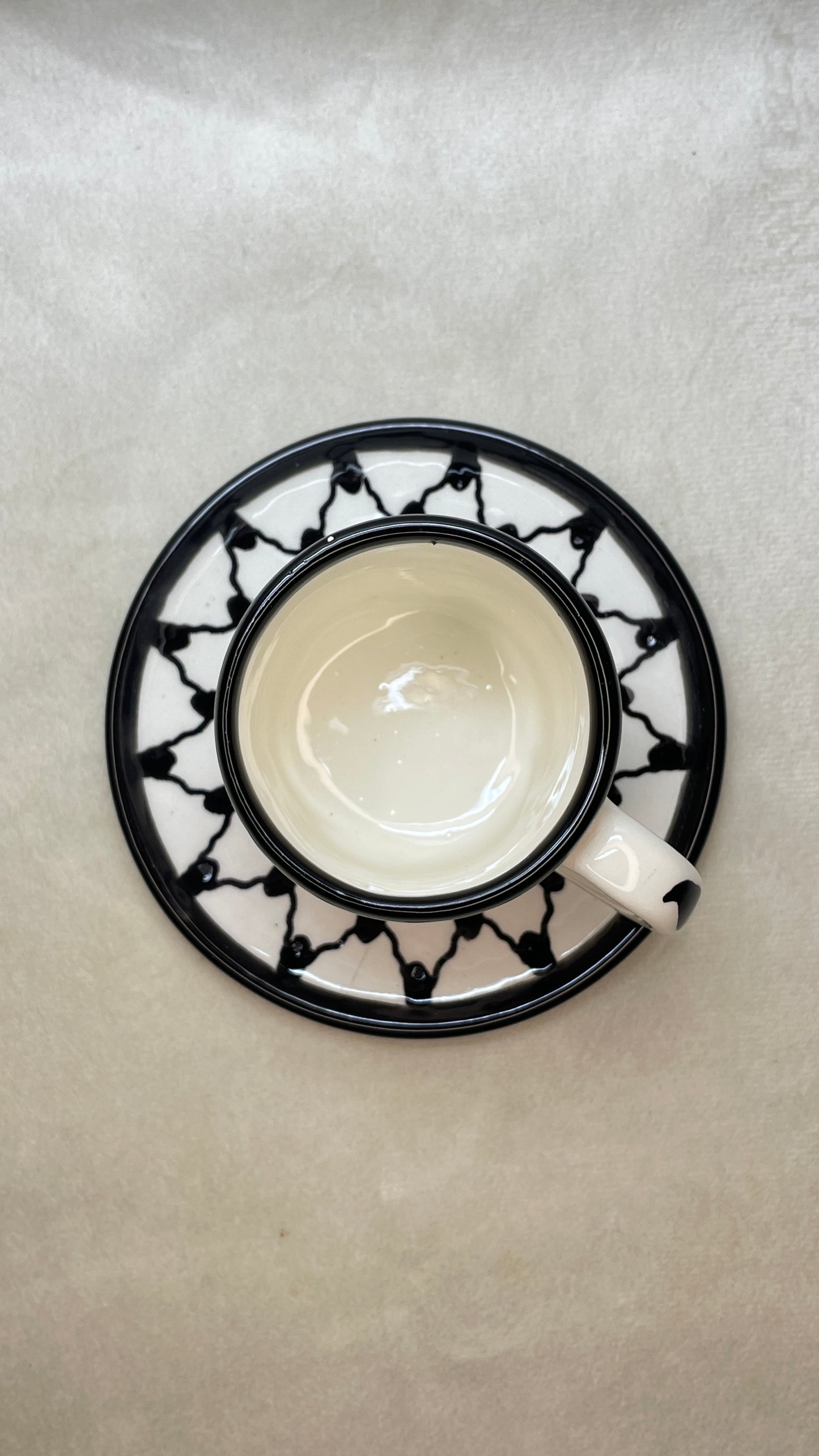 Finjan mit Untertasse