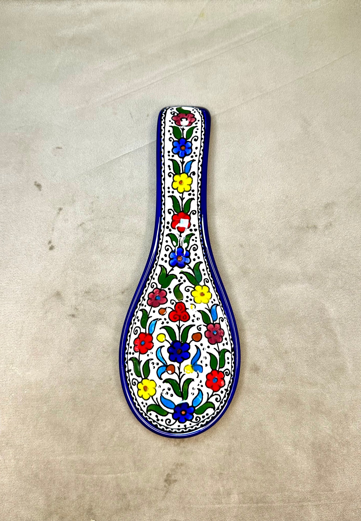 Serving plate in spoon shape colored