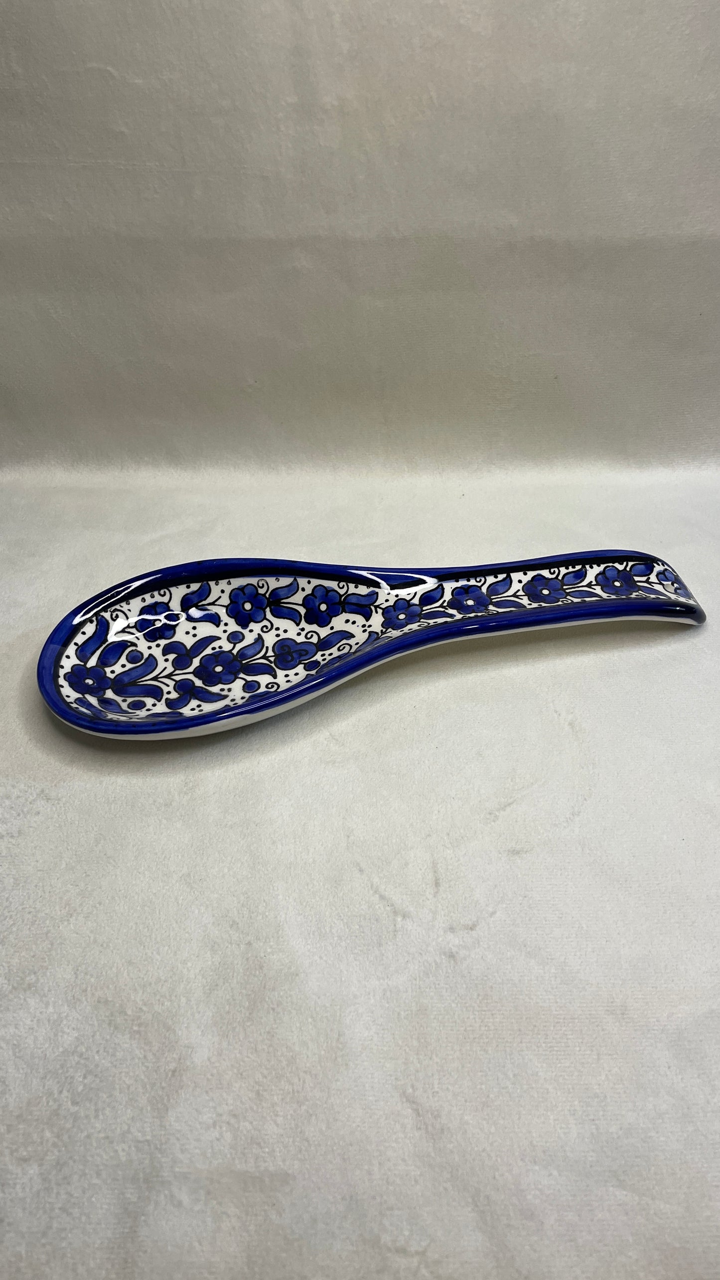 Serving plate in spoon shape blue