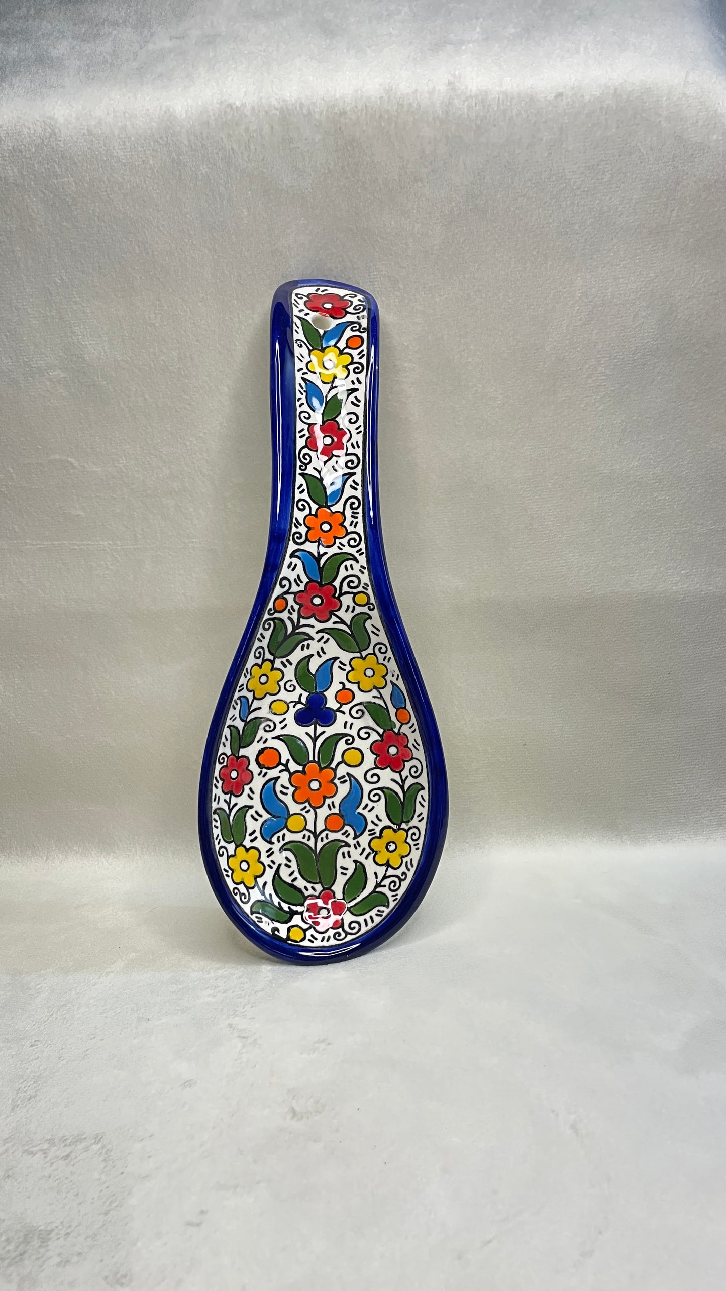 Serving plate in spoon shape colored