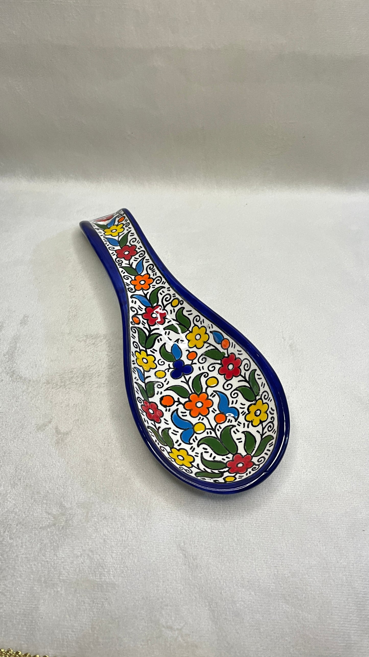 Serving plate in spoon shape colored