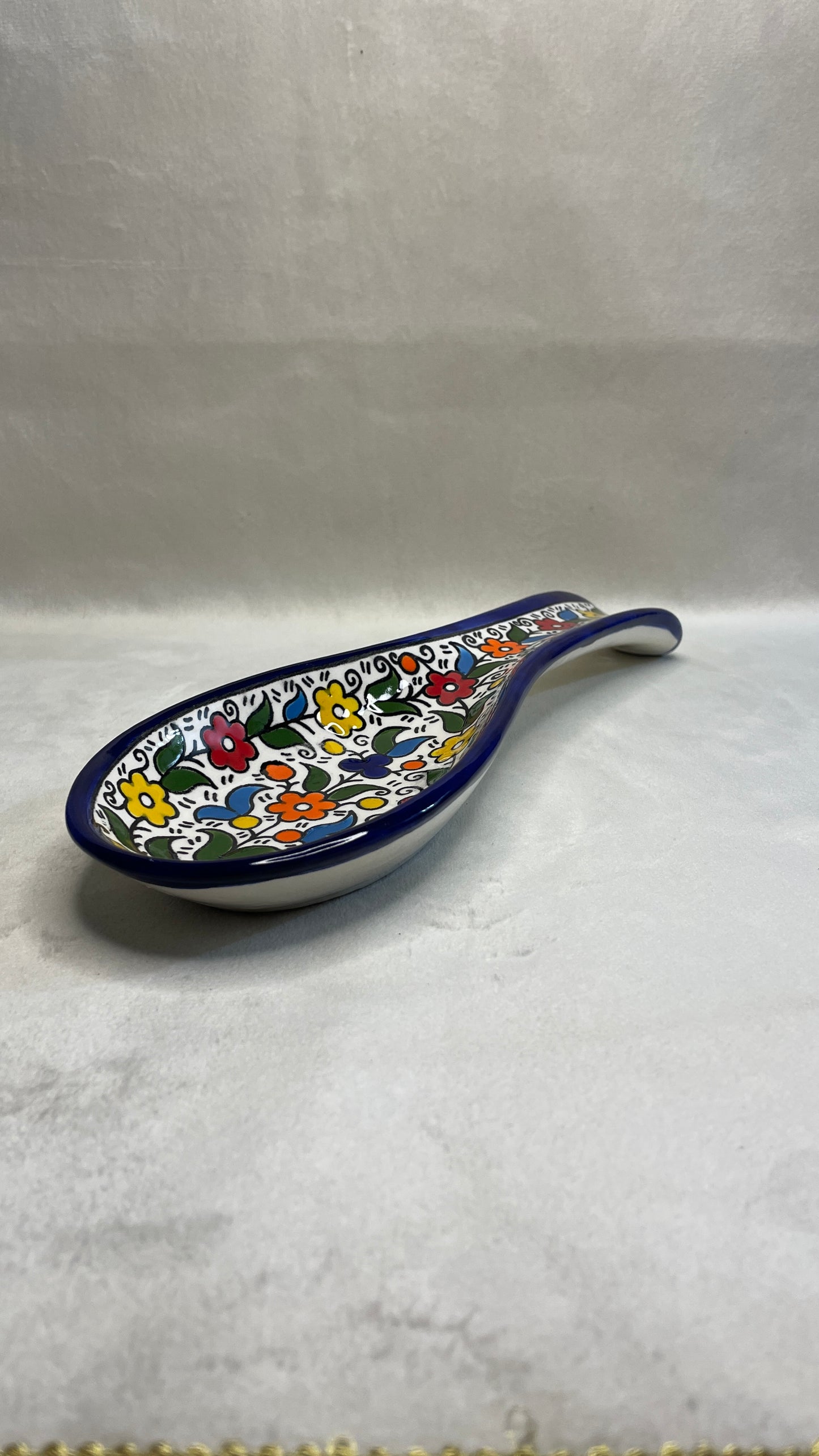 Serving plate in spoon shape colored