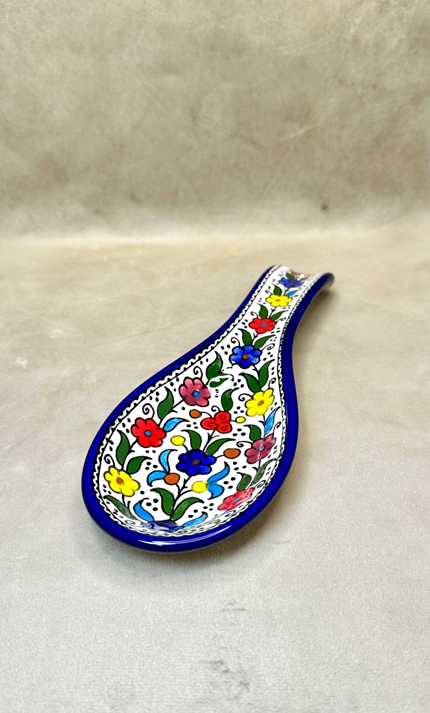 Serving plate in spoon shape colored