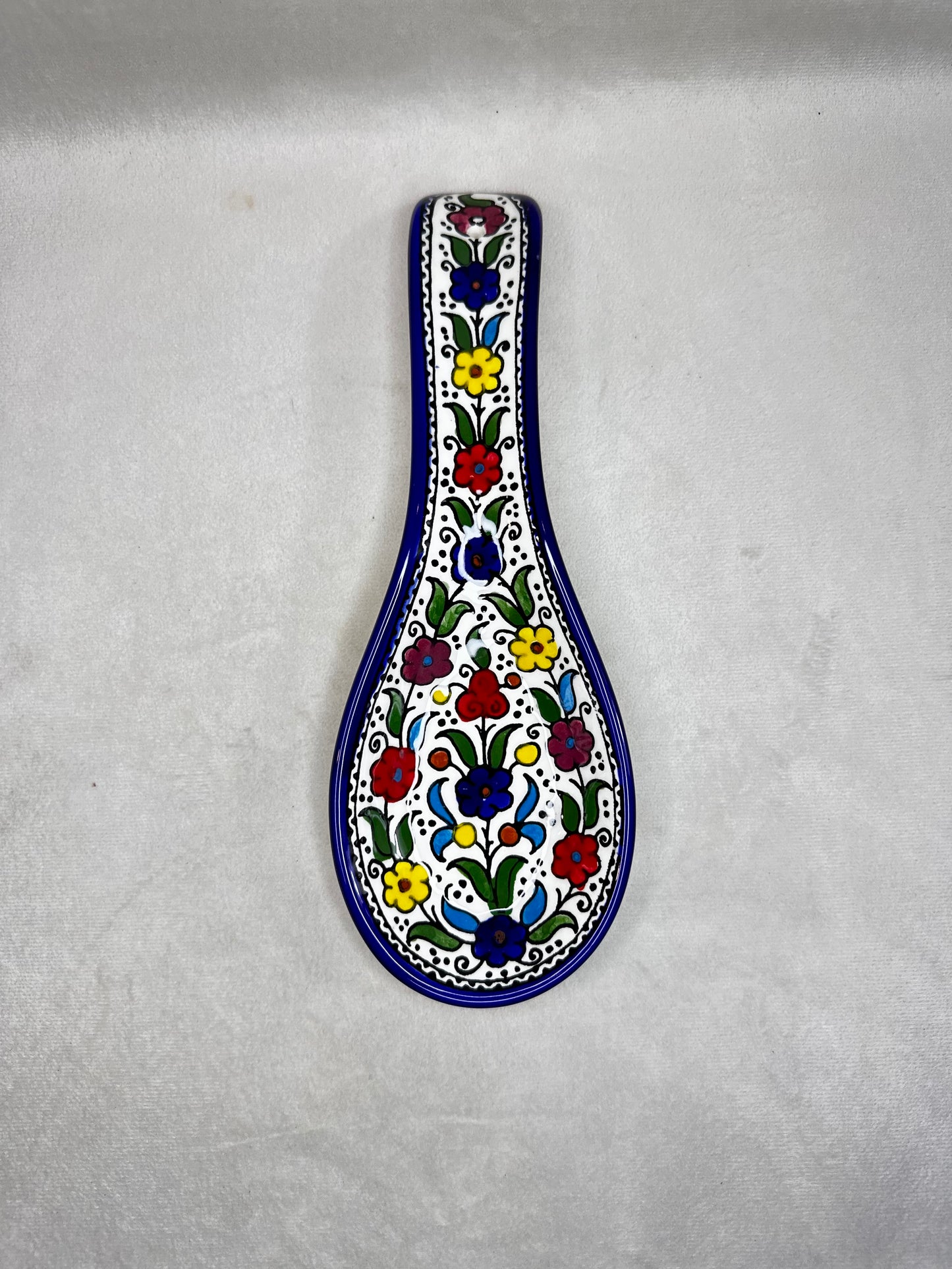 Serving plate in spoon shape colored